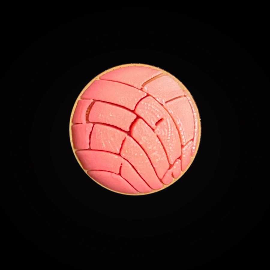 Top view of the Concha game piece showing width